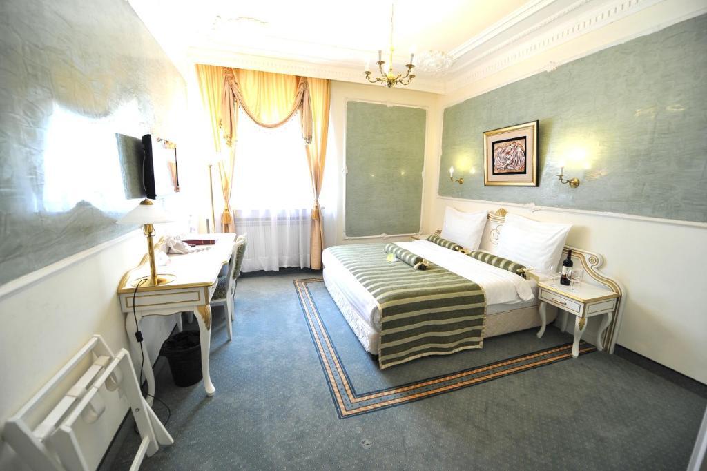 Queen'S Astoria Design Hotel Belgrade Chambre photo